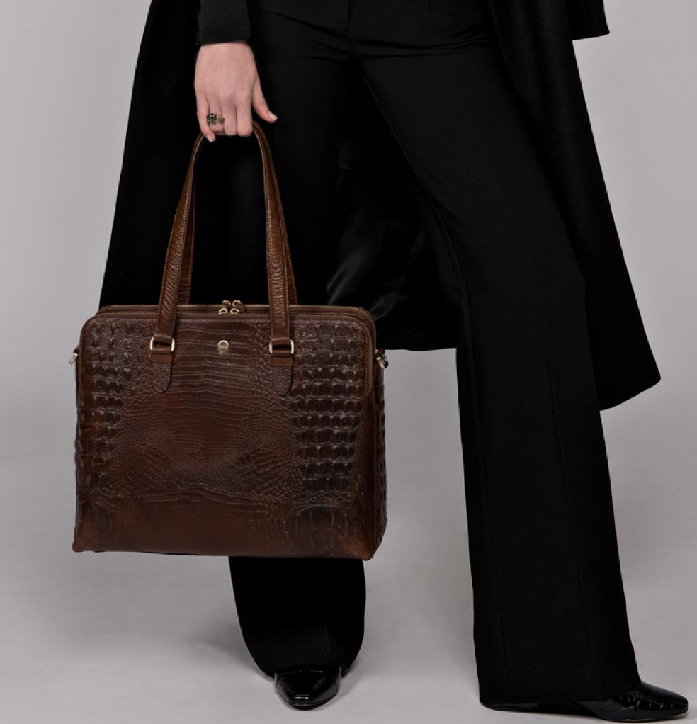 lady holding nice croco laptop bag